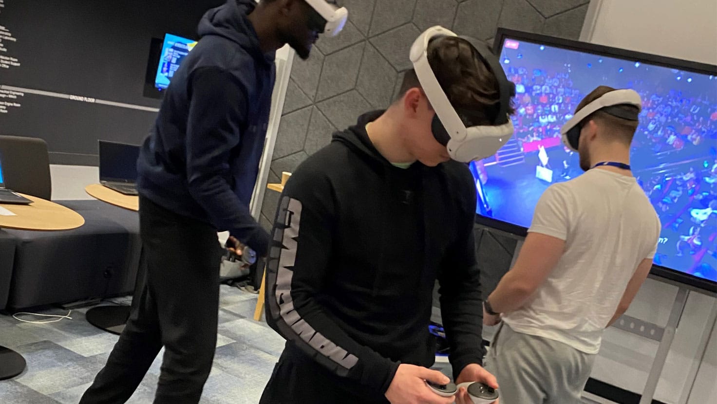 Students playing on VR headsets